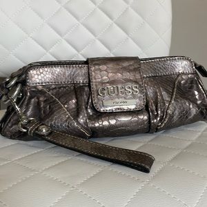 GUESS gunmetal metallic clutch/wristlet